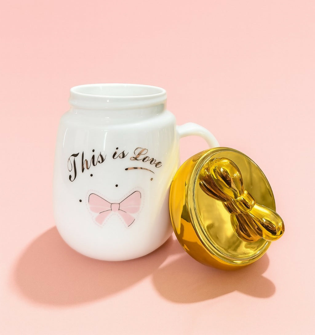 “This is Love†Ceramic Mug with Golden Heart Lid & Pink Bow Print