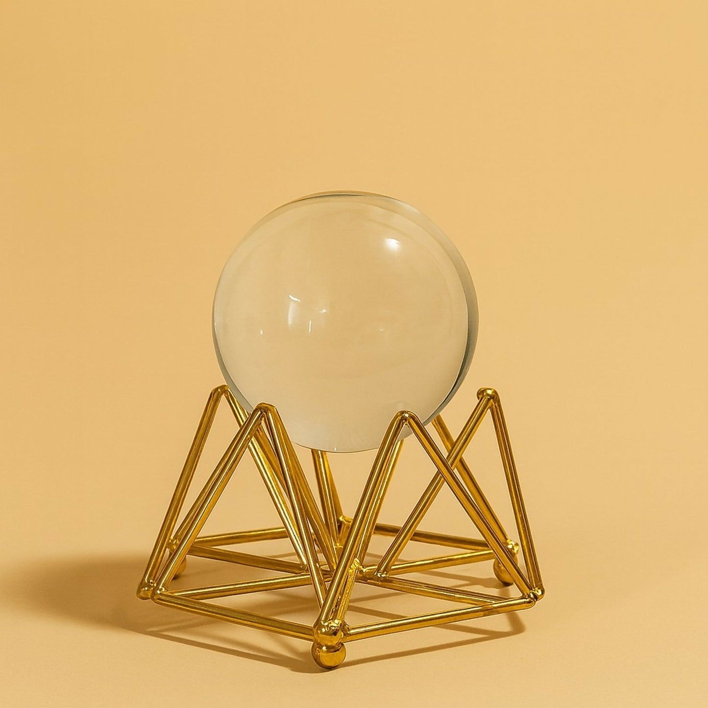 Decorative Crystal Ball with Premium Golden Geometric Stand for Home Office Desk | Clear Glass Sphere Showpiece for Table Decoration, Vastu, Meditation, Feng Shui, Gifting | Modern Luxury Home DÃ©cor Ornament