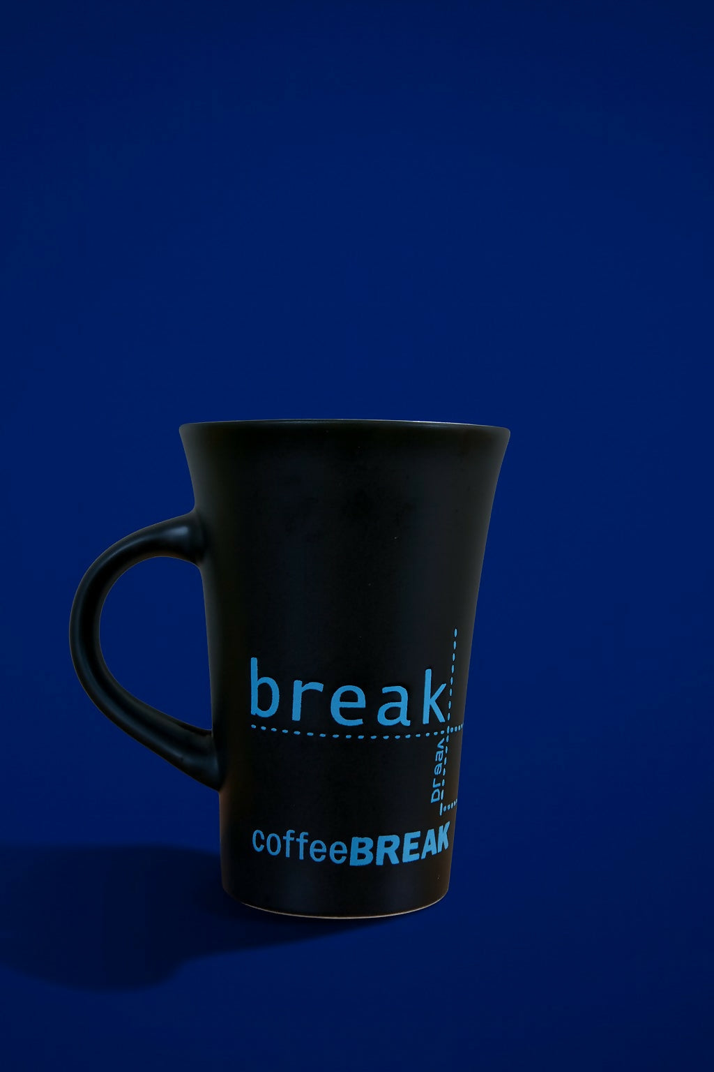 Black Ceramic Coffee Mug with Blue Spoon â€“ Stylish Office Mug